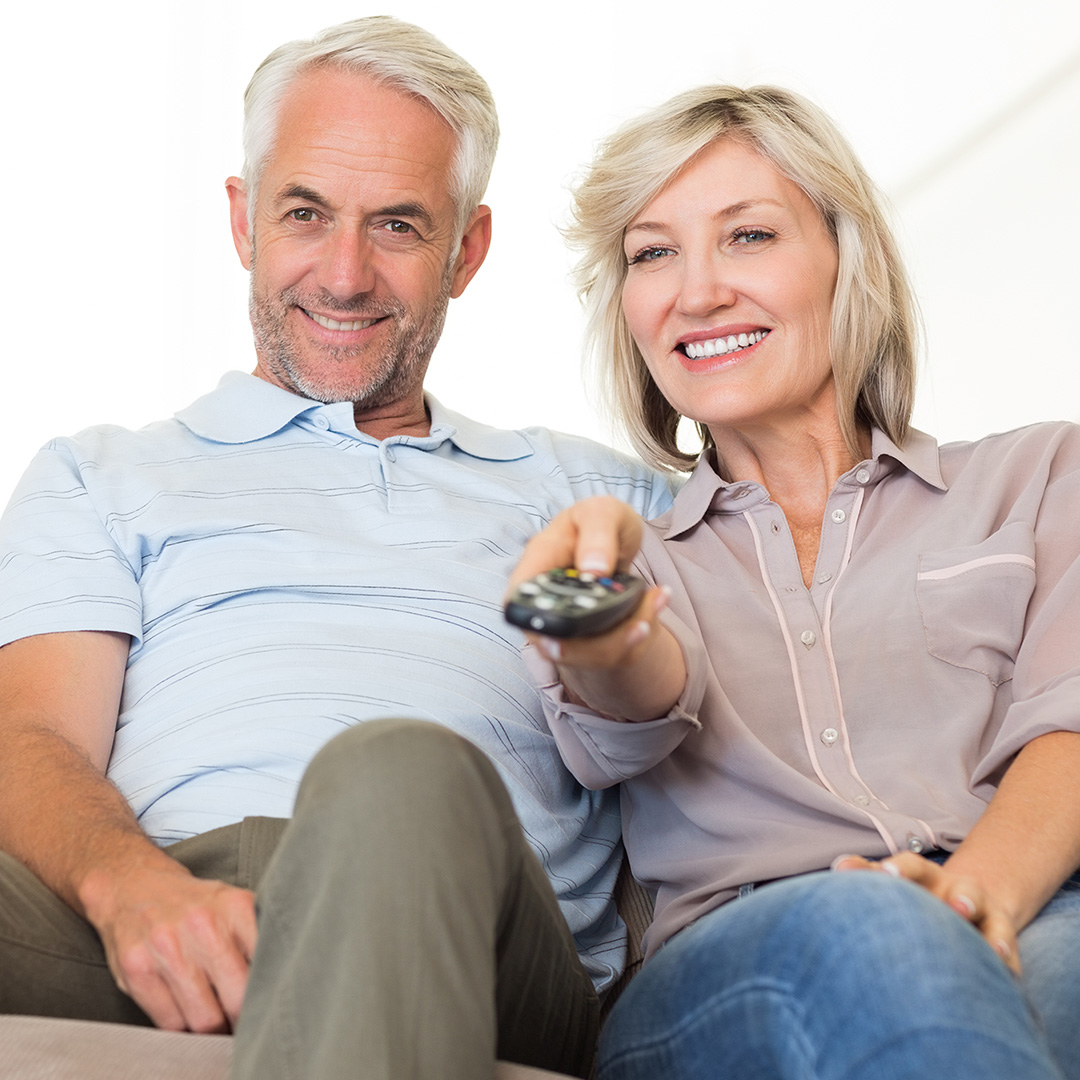Image of a couple watching tv